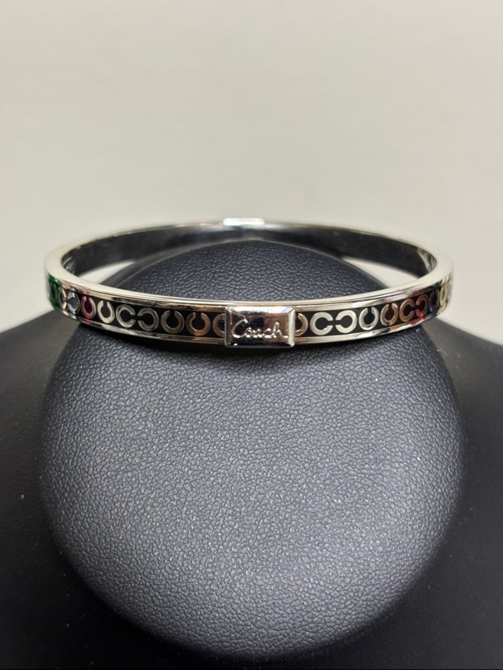 Coach Silver-Tone Signature C Black Enamel Accent Bangle Bracelet